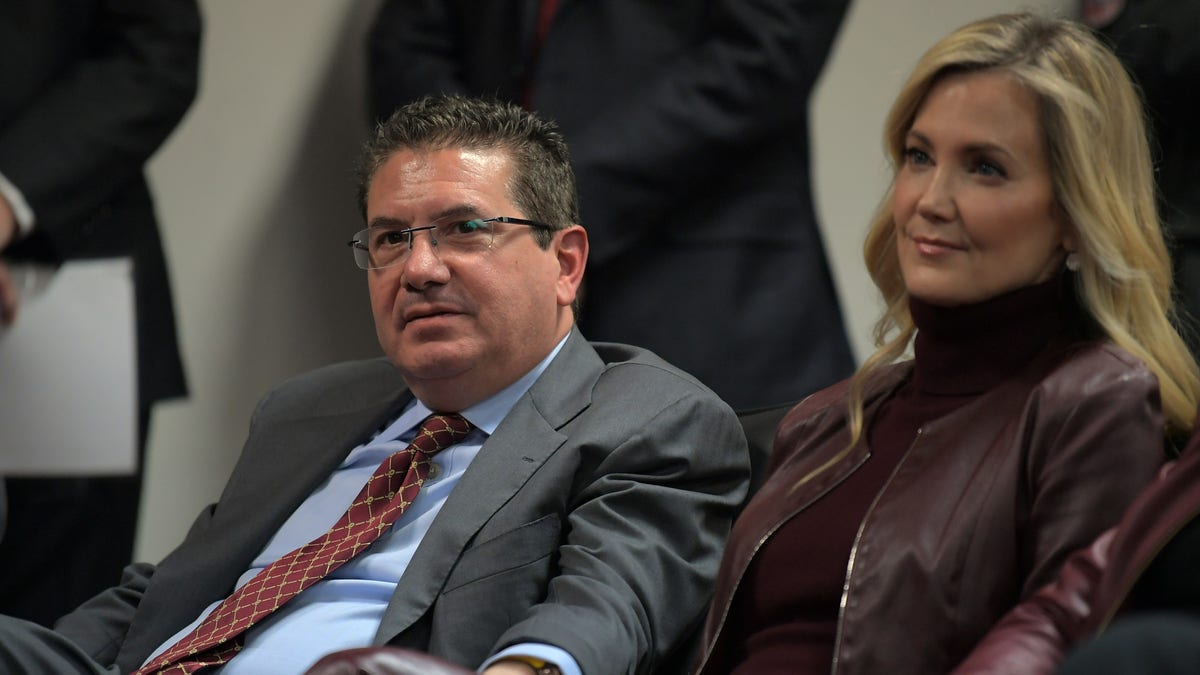 Washington owner Dan Snyder, left, sits with his wife Tanya Snyder in the audience as Ron Rivera is introduced as the Washington new head coach at a press conference in Ashburn, VA on Jan. 2, 2020.