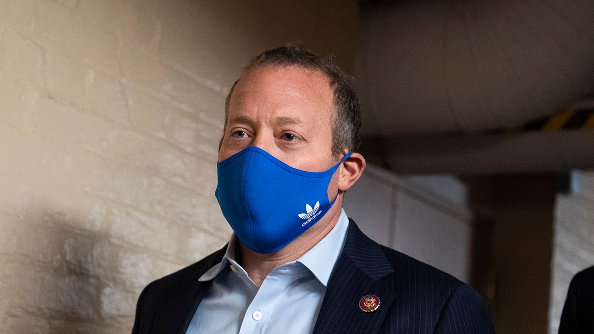 Rep. Josh Gottheimer, D-N.J., arrives for a meeting of the House Democratic Caucus on the infrastructure bill in the U.S. Capitol on Friday, Oct. 1, 2021.