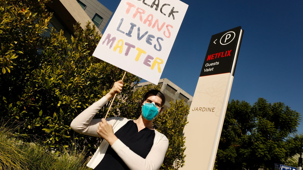 HOLLYWOOD CA OCTOBER 20, 2021 - Lily Weaver was outside Netflix's office in Hollywood Wednesday morning in support of a walkout to protest Netflix's decision to release Dave Chappelle's latest Netflix special, which contains a litany of transphobic material. Weaver is not employed by Netflix. (Al Seib / Los Angeles Times via Getty Images)