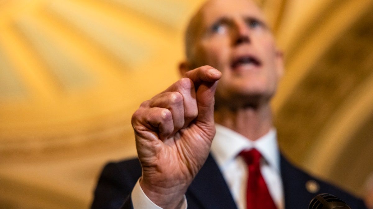 WASHINGTON, DC - OCTOBER 26: Sen. Rick Scott (R-FL) gestures as he speaks during a press conference following the Republicans Policy Luncheon at the U.S. Capitol building on October 26, 2021 in Washington, DC. Democrats continue to negotiate within their party as they try to get the major parts of President Joe Biden's legislative agenda through Congress. (Photo by Samuel Corum/Getty Images)