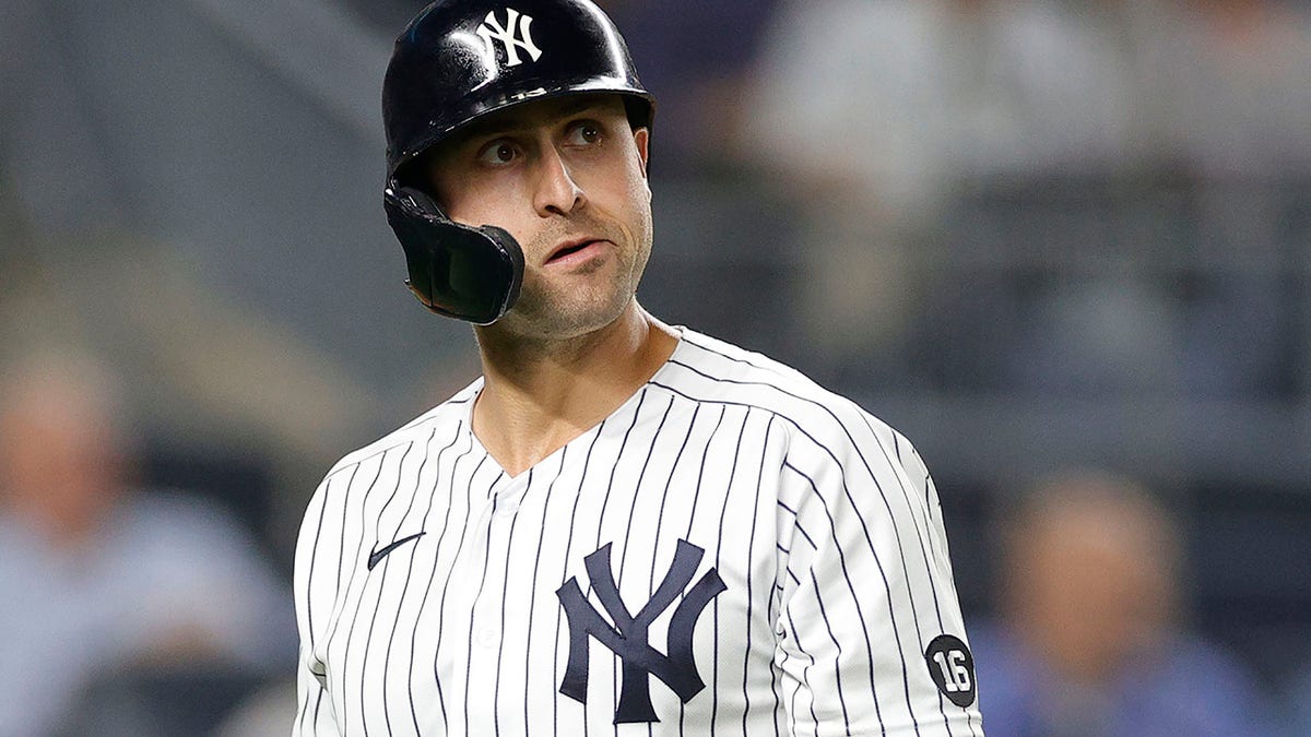 Joey Gallo #13 of the New York Yankees reacts after striking out during the third inning against the Texas Rangers at Yankee Stadium on September 21, 2021 in the Bronx borough of New York City.