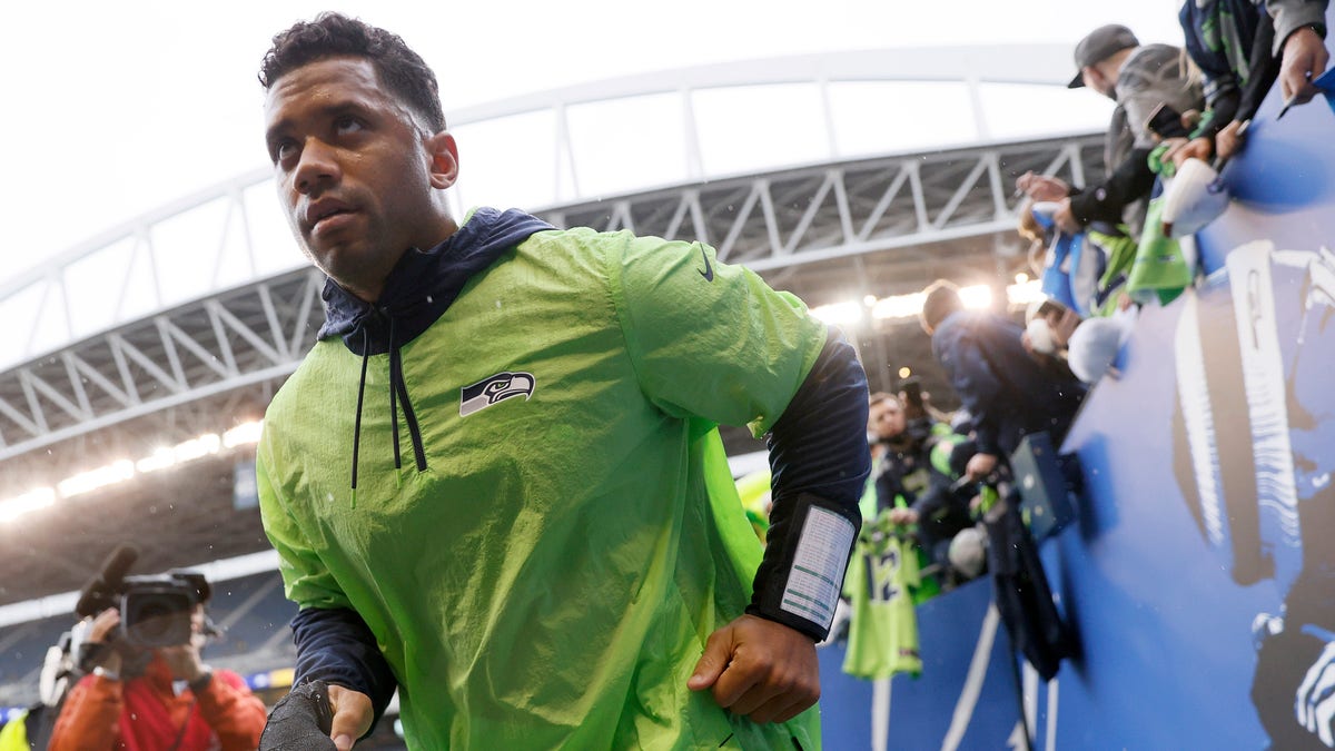 Russell Wilson of the Seattle Seahawks participates in warmups prior to a game against the New Orleans Saints at Lumen Field on Oct. 25, 2021, in Seattle, Washington. 