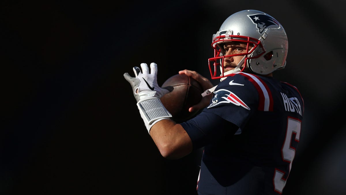 Brian Hoyer of the New England Patriots warms up during the game against the New York Jets at Gillette Stadium on Oct. 24, 2021, in Foxborough, Massachusetts. 