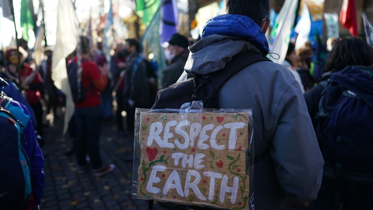 GLASGOW, SCOTLAND - OCTOBER 30: Pilgrimage groups who have walked to Glasgow are joined by members of the group, Extinction Rebellion as they walk to raise awareness of the climate crisis on October 30, 2021 in Glasgow, Scotland.