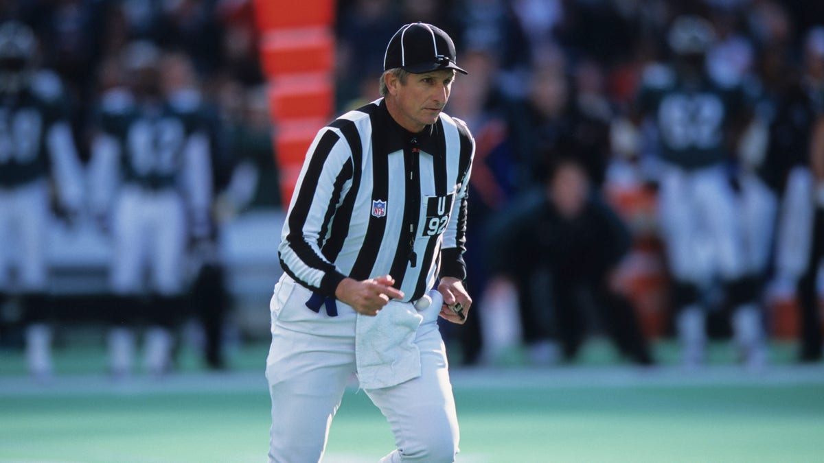 National Football League umpire Carl Madsen pursues the play during a game between the Washington Redskins and Philadelphia Eagles at Veterans Stadium on Oct. 8, 2000 in Philadelphia, Pennsylvania. (Photo by George Gojkovich/Getty Images)