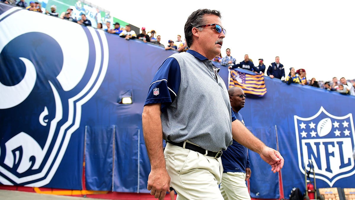 LOS ANGELES, CA - DECEMBER 11:  Head coach Jeff Fisher of the Los Angeles Rams takes to the field before the game against the Atlanta Falcons at Los Angeles Memorial Coliseum on December 11, 2016 in Los Angeles, California.  (Photo by Harry How/Getty Images)