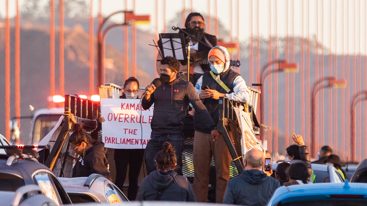 SAN FRANCISCO, CA - SEPTEMBER 30: Protesters block northbound traffic on the Golden Gate Bridge in San Francisco, CA. Thursday, September 30, 2021 during a demonstration demanding Congress grant a pathway to citizenship for the country's 11 million undocumented people. (Jessica Christian/The San Francisco Chronicle via Getty Images)