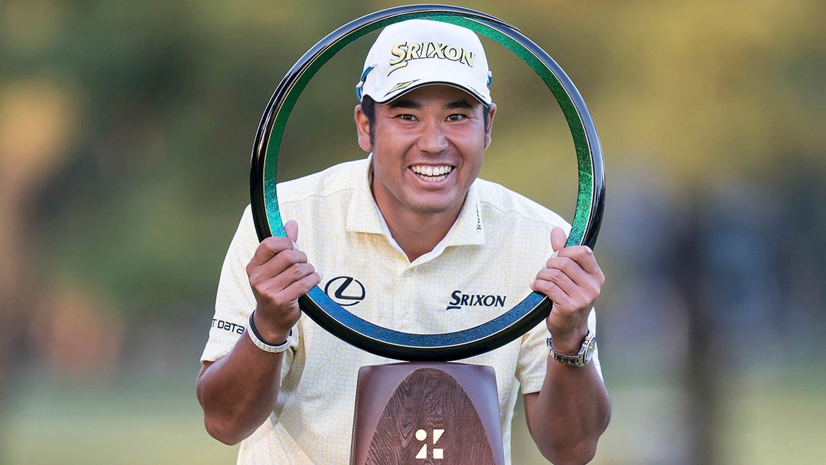 Hideki Matsuyama of Japan poses with the trophy after winning the final round of the Zozo Championship golf tournament at Accordia Golf Narashino Country Club on Sunday, Oct. 24, 2021 in Inzai, Chiba Prefecture, Japan.