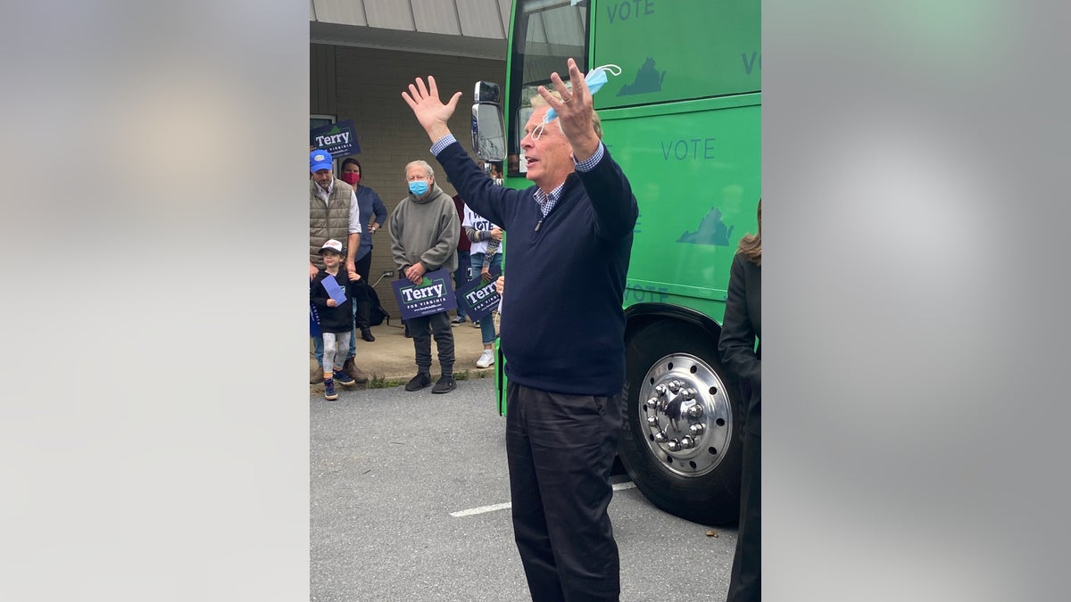 Virginia Democratic gubernatorial candidate Terry McAuliffe greets a handful of supporters outside the Virginia Democrats regional headquarters in Harrisonburg, Virginia