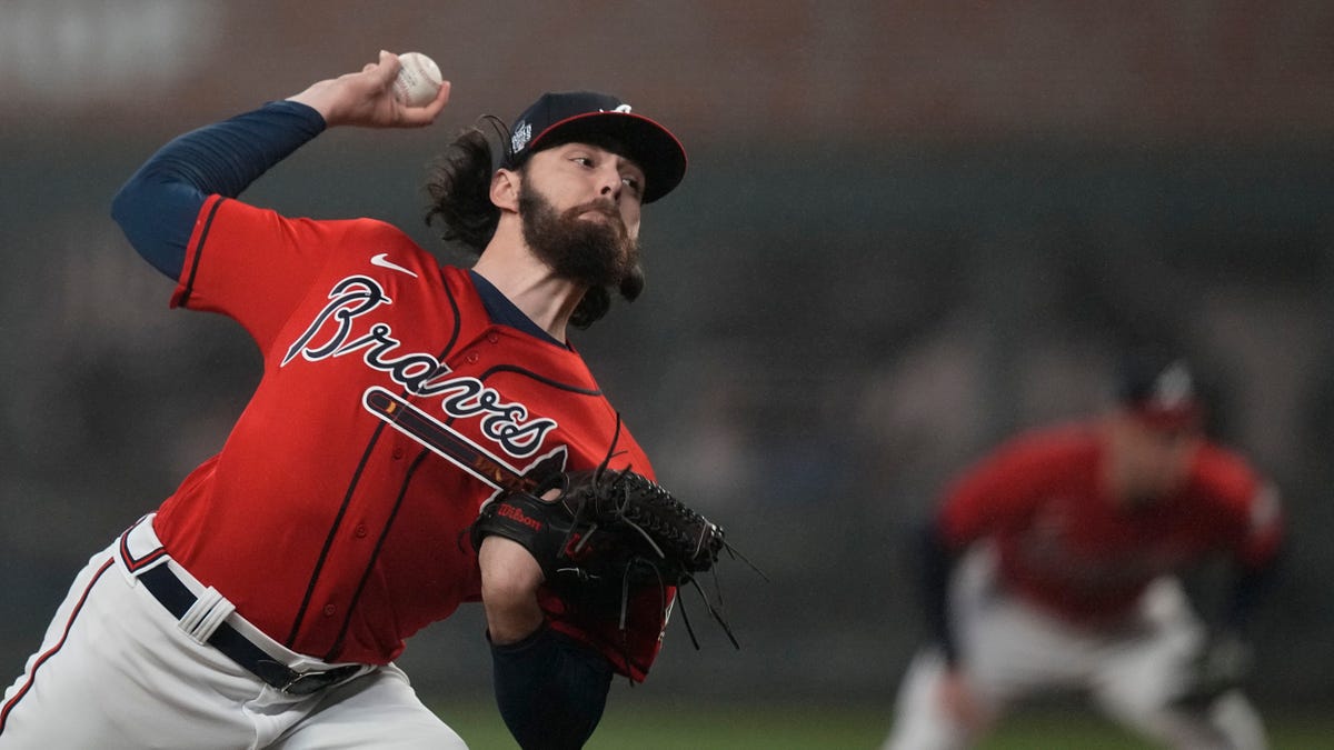 Atlanta Braves starting pitcher Ian Anderson throws during the first inning in Game 3 of baseball's World Series between the Houston Astros and the Atlanta Braves Friday, Oct. 29, 2021, in Atlanta.