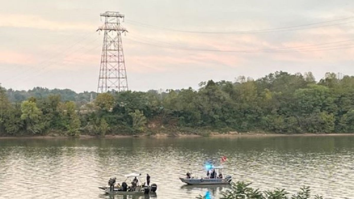 Human remains discovered last year inside a submerged SUV in an Indiana river have been identified as belonging to an Ohio woman who went missing two decades ago with her two children, authorities said Monday.