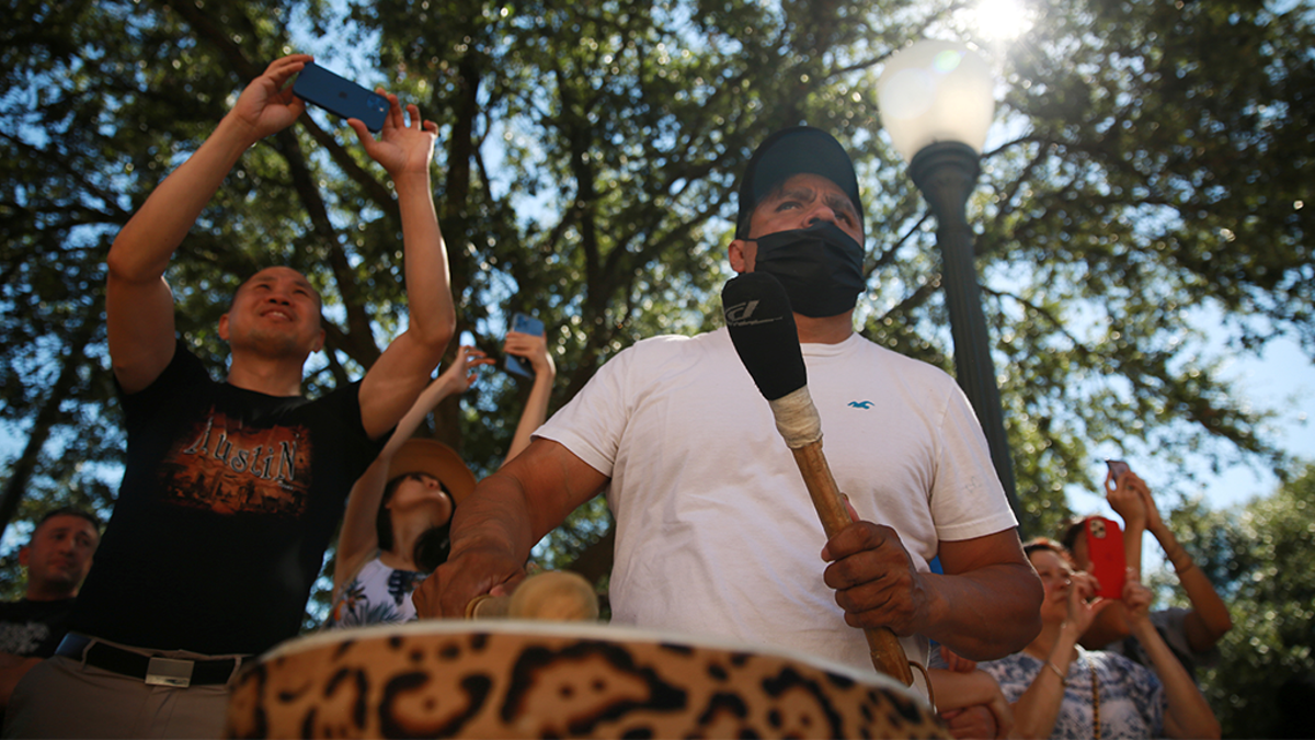 Event to mark Indigenous People's day is held in Austin Javier Flores of Danza Azteca Guadalupana performs during an event to mark Indigenous Peoples' day at the capitol grounds in Austin, Texas, U.S., October 9, 2021. REUTERS/Pu Ying Huang