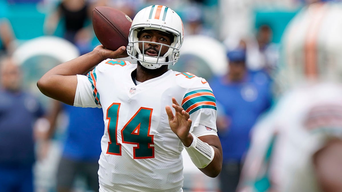 Miami Dolphins quarterback Jacoby Brissett (14) aims a pass during the first half of an NFL football game against the Indianapolis Colts, Sunday, Oct. 3, 2021, in Miami Gardens, Florida.