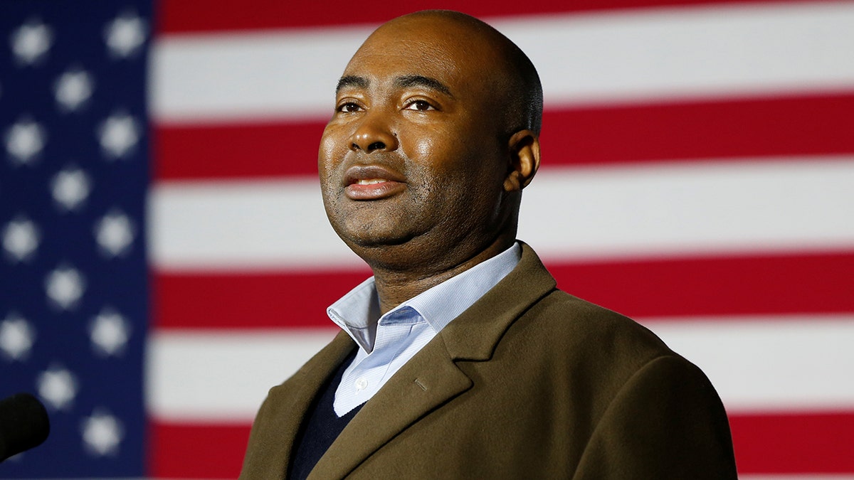 FILE - Jaime Harrison speaks at a watch party during Election Day in Columbia, South Carolina, Nov. 3, 2020.  REUTERS/Randall Hill
