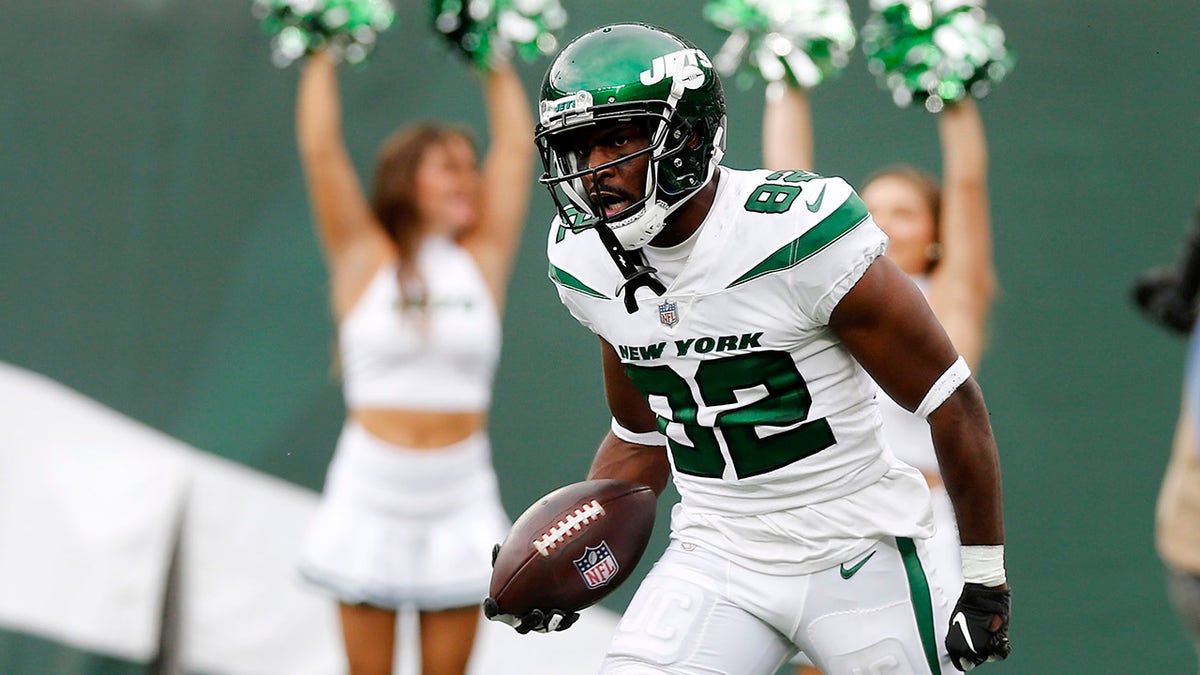 EAST RUTHERFORD, NEW JERSEY - OCTOBER 03: Jamison Crowder #82 of the New York Jets in action against the Tennessee Titans at MetLife Stadium on October 03, 2021 in East Rutherford, New Jersey. The Jets defeated the Titans 27-24 in overtime.