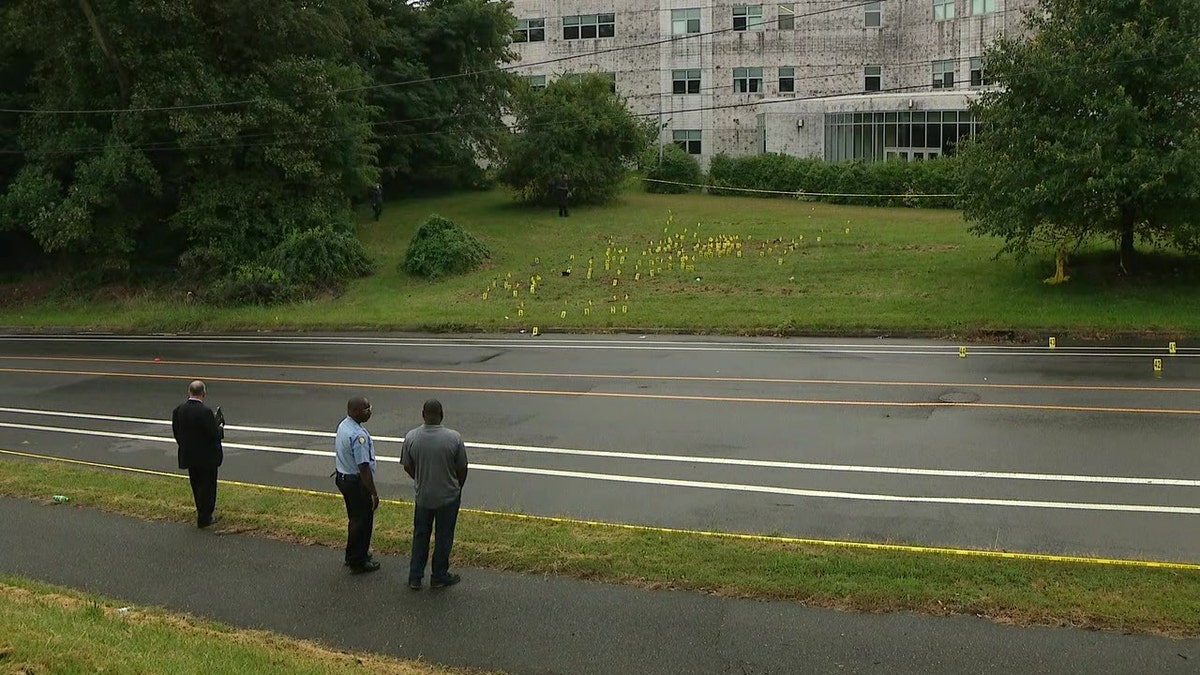 A nurse at a Philadelphia hospital fatally shot his co-worker early Monday and fled the scene in a U-Haul truck before wounding two police officers in a gunfight, authorities said.