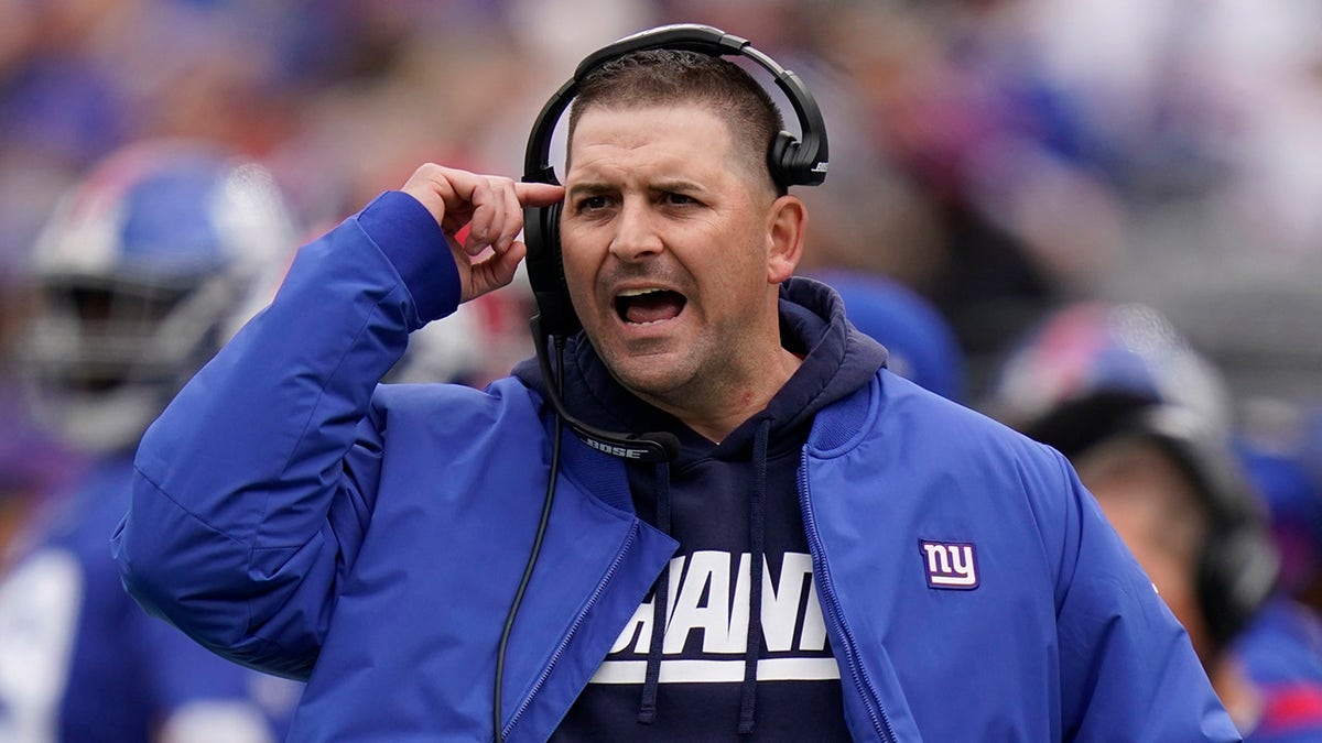 New York Giants head coach Joe Judge calls out to his players during the first half of an NFL football game against the Carolina Panthers, Sunday, Oct. 24, 2021, in East Rutherford, New Jersey.