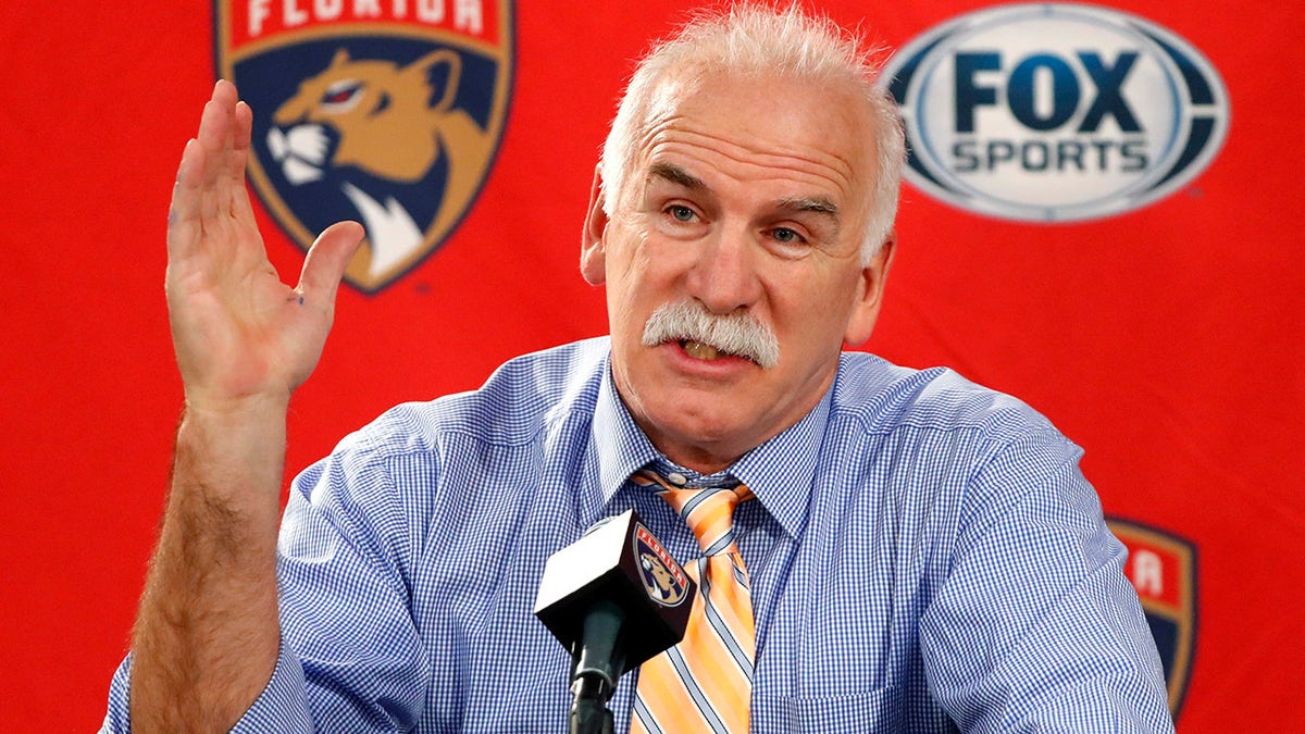 FILE - In this Jan. 21, 2020, file photo, Florida Panthers head coach and former Chicago Blackhawks coach, Joel Quenneville, responds to a question during his first visit back to Chicago as a head coach before an NHL hockey game between the Blackhawks and Panthers. The Blackhawks are holding a briefing Tuesday, Oct. 26, 2021, to discuss the findings of an investigation into allegations that an assistant coach sexually assaulted a player in 2010. The Blackhawks pledged to release the findings of the investigation, which general manager Stan Bowman, former coach Quenneville and others who were in the organization at the time agreed to cooperate with.