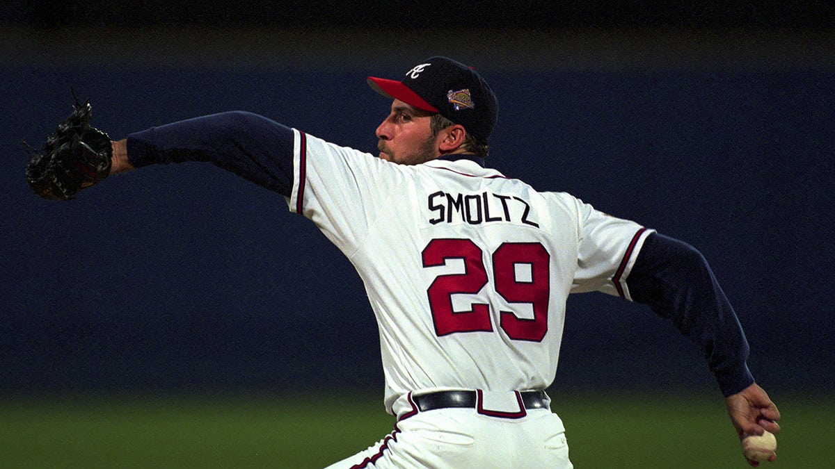 ATLANTA, GA - MAY 1996: John Smoltz #47 of the Atlanta Braves pitching to the New York Yankees during the 1996 World Series on October 24, 1996 in Atlanta, Georgia.