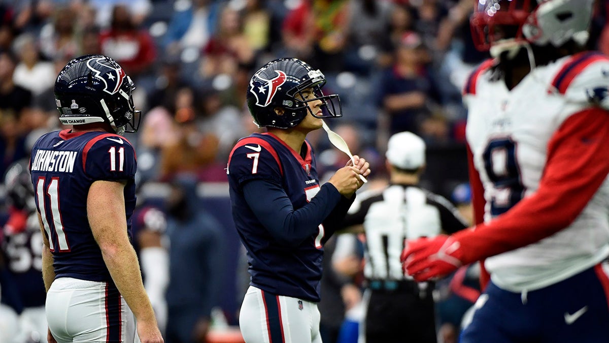Houston Texans place kicker Ka'imi Fairbairn (7) reacts after missing an extra point against the New England Patriots during the first half of an NFL football game Sunday, Oct. 10, 2021, in Houston.
