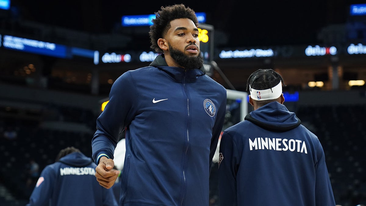 Karl-Anthony Towns of the Minnesota Timberwolves looks on before a preseason game against the New Orleans Pelicans Oct. 4, 2021 at Target Center in Minneapolis, Minn.