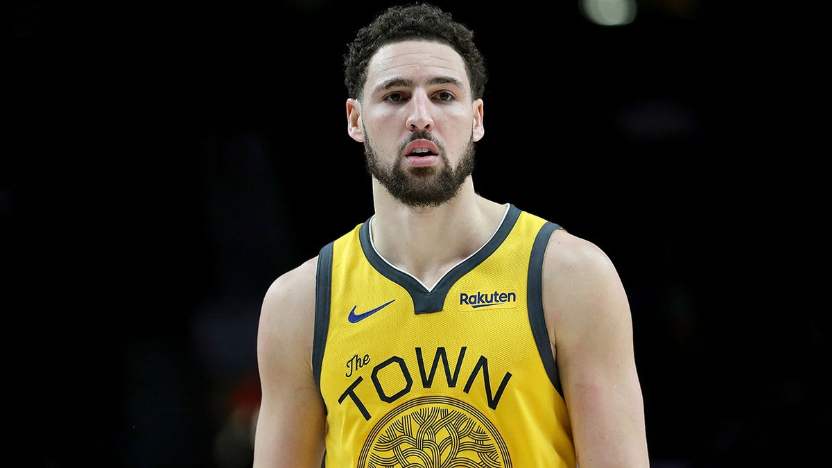 Klay Thompson of the Golden State Warriors reacts against the Portland Trail Blazers in the third quarter during their game at Moda Center on Feb. 13, 2019, in Portland, Oregon.
