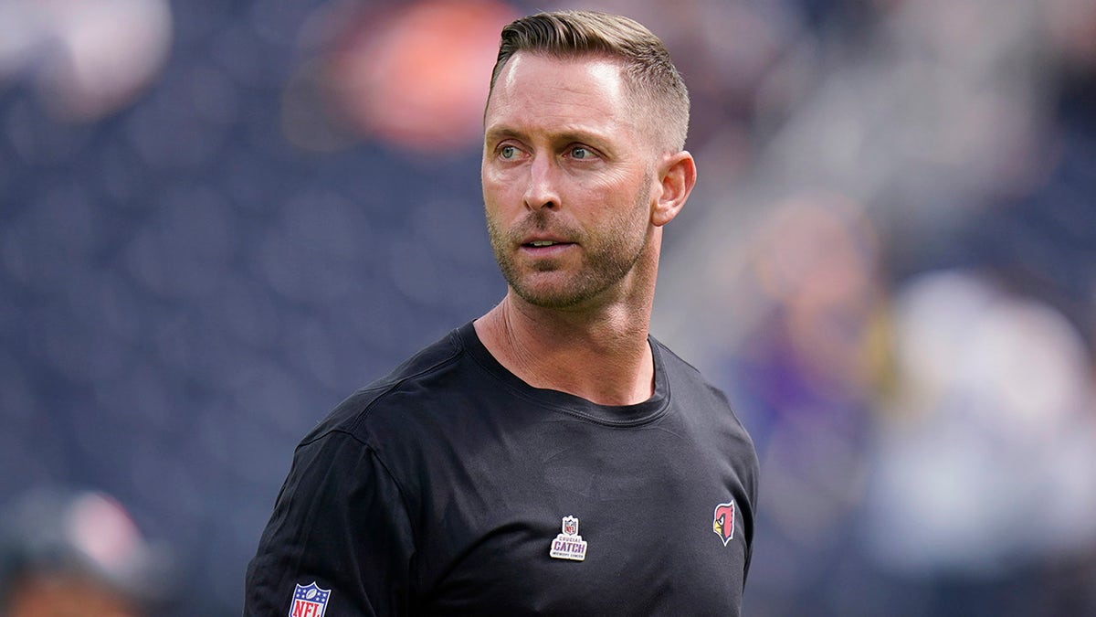 Arizona Cardinals coach Kliff Kingsbury walks on the field before the Oct. 3, 2021, game against the Los Angeles Rams in Inglewood, California.