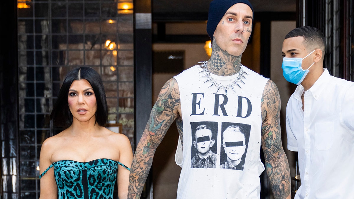 Kourtney Kardashians fiance Travis Barker looks unrecognizable as he  removes face tattoos and wears wig in new photos  The Sun