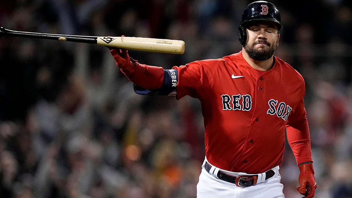 Boston Red Sox's Kyle Schwarber tosses his bat after a grand slam home run against the Houston Astros during the second inning in Game 3 of baseball's American League Championship Series Monday, Oct. 18, 2021, in Boston.