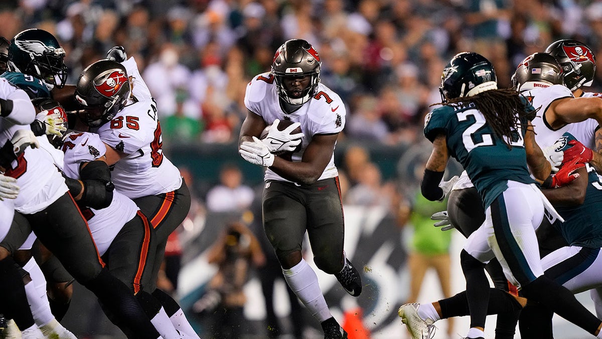 Tampa Bay Buccaneers running back Leonard Fournette (7) runs with the ball during the second half of an NFL football game against the Philadelphia Eagles on Thursday, Oct. 14, 2021, in Philadelphia.
