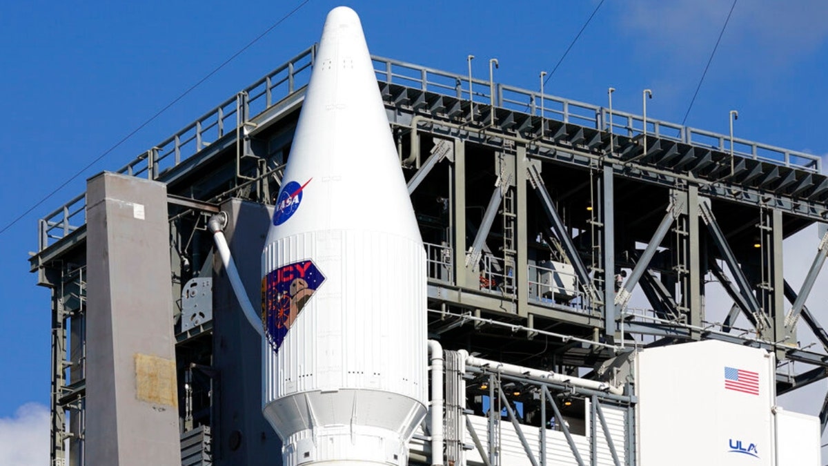 The Lucy spacecraft sits atop a United Launch Alliance Atlas V rocket ready for launch at Launch Complex 41 at the Cape Canaveral Space Force Station, Friday, Oct. 15, 2021, in Cape Canaveral, Fla. Lucy, scheduled to launch Saturday at 5:34am will observe Trojan asteroids, a unique family of asteroids that orbit the sun in front of and behind Jupiter.