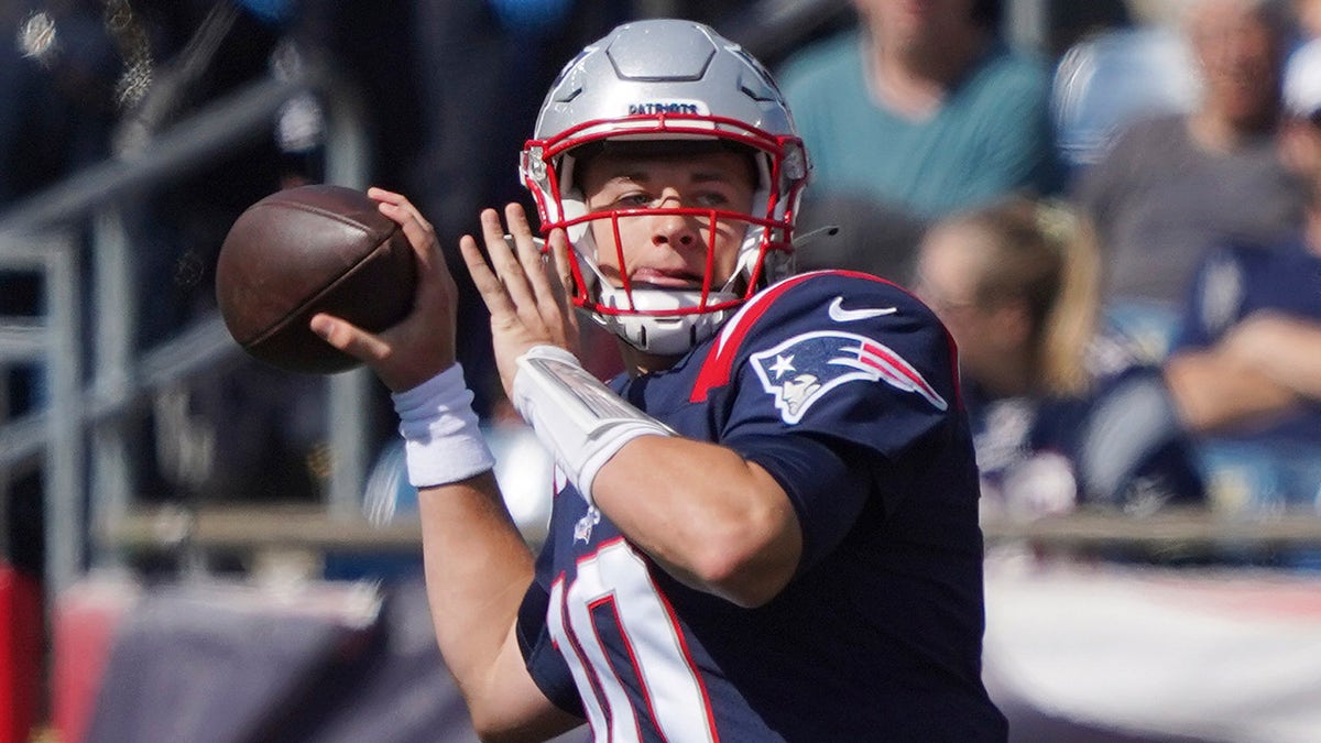 New England Patriots quarterback Mac Jones throws a pass during the first half of an NFL football game against the New Orleans Saints, Sunday, Sept. 26, 2021, in Foxborough, Massachusetts.
