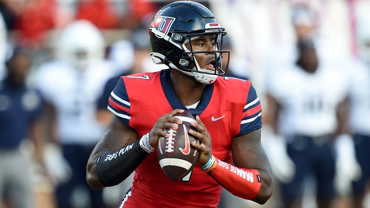 Malik Willis of the Liberty Flames drops back to pass against the Old Dominion Monarchs at Williams Stadium Sept. 18, 2021 in Lynchburg, Virginia.
