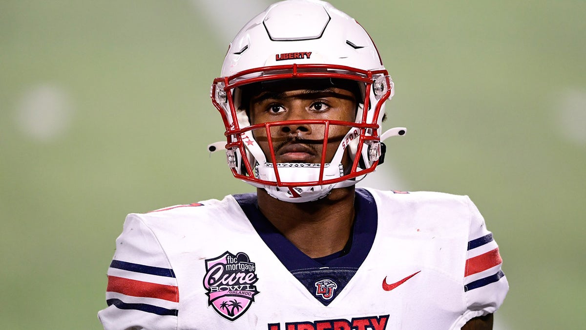 Liberty Flames quarterback Malik Willis looks on during the second half against the Coastal Carolina Chanticleers during the Cure Bowl at Camping World Stadium.