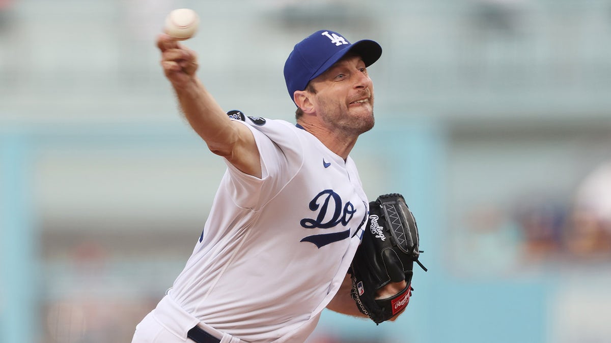 Max Scherzer #31 of the Los Angeles Dodgers pitches in the first inning against the St. Louis Cardinals during the National League Wild Card Game at Dodger Stadium on October 06, 2021 in Los Angeles, California.