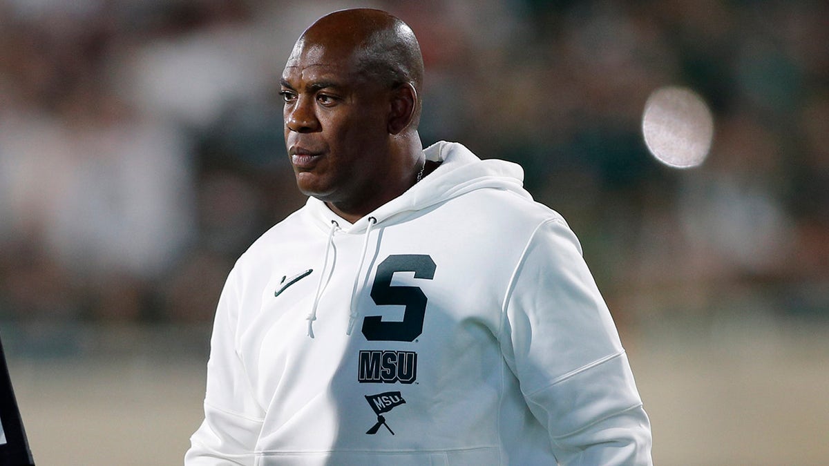 Michigan State coach Mel Tucker talks with officials during an NCAA football game on Saturday, Sept. 25, 2021, in East Lansing, Michigan. 