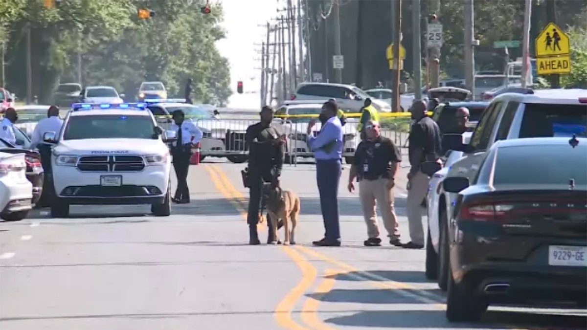 Two Postal Service employees were killed Tuesday at a Memphis, Tenn., post office and the suspected shooter, also an employee, died from a self-infliced gunshot, authorities said.