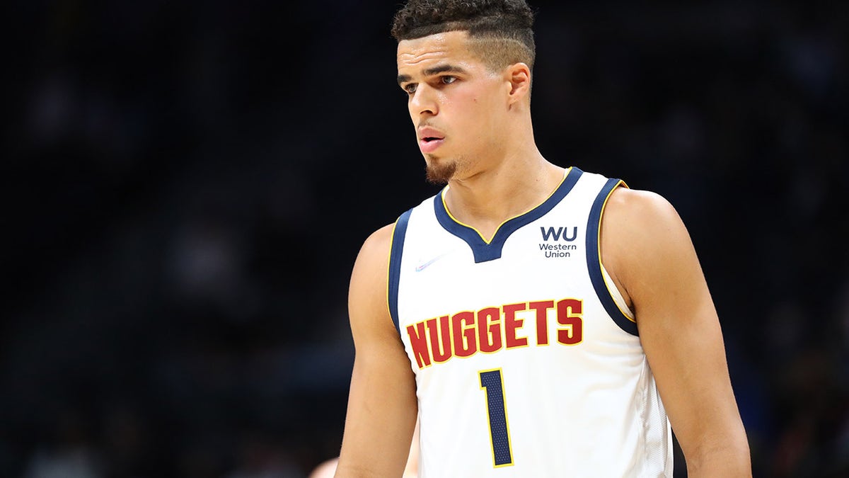 Michael Porter Jr. #1 of the Denver Nuggets looks on against the Minnesota Timberwolves during the first quarter at Ball Arena on October 8, 2021 in Denver, Colorado.