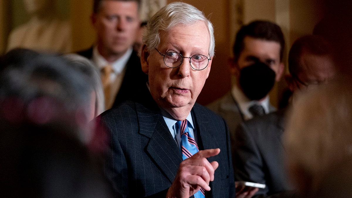 Senate Minority Leader Mitch McConnell speaks to reporters after a Republican strategy meeting at the Capitol in Washington, Oct. 19, 2021.
