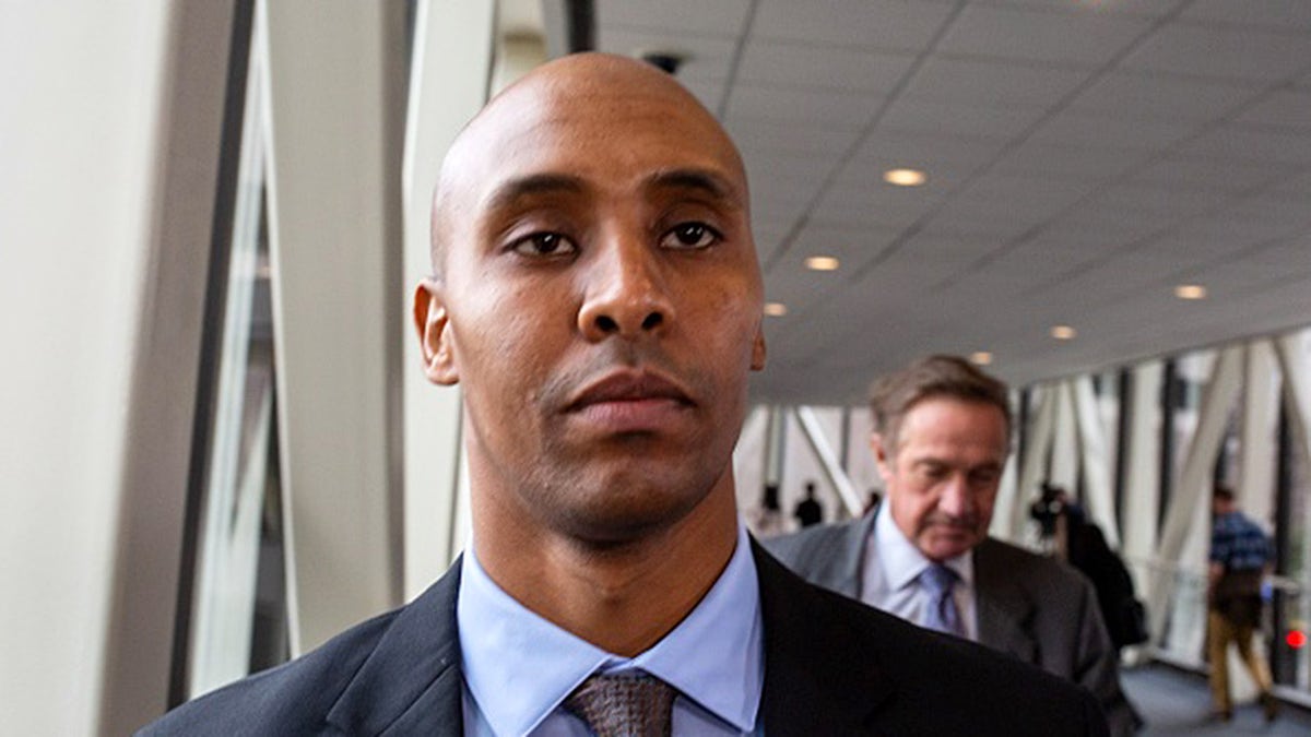 Former Minneapolis police officer Mohamed Noor leaves the Hennepin County Government Center in Minneapolis, Minnesota on April 2, 2019. - Jury selection began April 1, 2019, in the murder trial of a former Minnesota police officer who fatally shot an unarmed Australian woman, provoking outrage in the United States and in the victim's home country. Prosecutors say Somali-American Mohamed Noor opened fire on Justine Damond in Minneapolis in July 2017 while seated in the passenger seat of his squad car.
