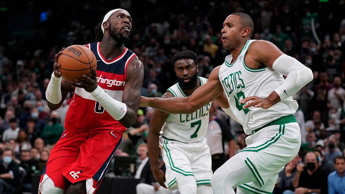 Boston Celtics player Al Horford plays defense