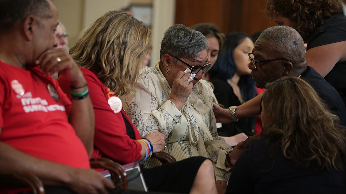 The Rev. Sharon Risher, who had lost mother Ethel Lance and cousins Tyzwana Sanders and Susie Jackson in the 2015 Emanuel African Methodist Episcopal Church shooting in Charleston, South Carolina, wipes tear during a gun control forum Sept. 10, 2019 on Capitol Hill in Washington, D.C. (Photo by Alex Wong/Getty Images)