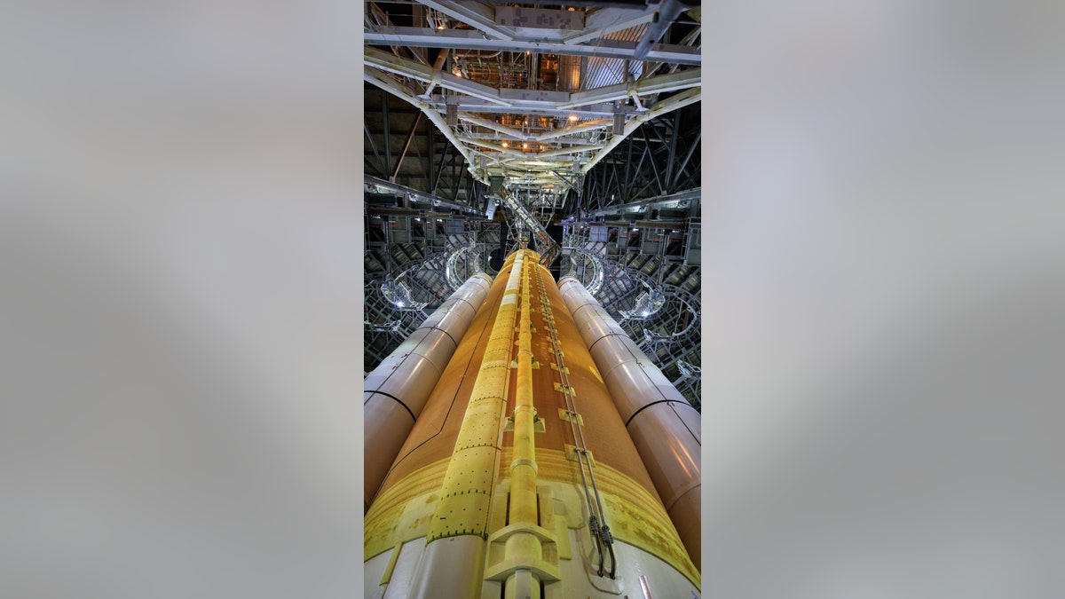 This close-up view shows the SLS rocket for Artemis I inside High Bay 3 of the Vehicle Assembly Building (VAB) at NASA’s Kennedy Space Center in Florida on Sept. 20, 2021. Inside the VAB, the rocket recently completed the umbilical retract and release test and the integrated modal test.