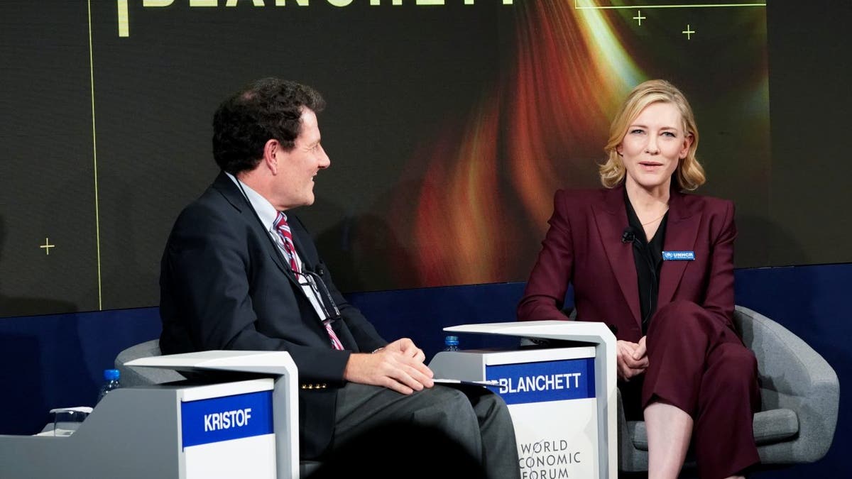 Cate Blanchett, Goodwill Ambassador, United Nations High Commissioner for Refugees (UNHCR), and Nicholas D. Kristof, Columnist at New York Times, speak during the World Economic Forum (WEF) annual meeting in Davos