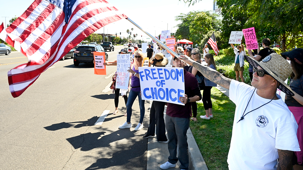 TORRANCE, CA - OCTOBER 01: A protest against mandated vaccination took place in front of Torrance Memorial Medical Center in Torrance on Friday, October 1, 2021. The event was organized by a nurse representing more than 40 colleagues facing suspension over their choice to not vaccinate. More than 100 people gathered to assert their right to free speech on the matter. (Photo by Brittany Murray/MediaNews Group/Long Beach Press-Telegram via Getty Images)