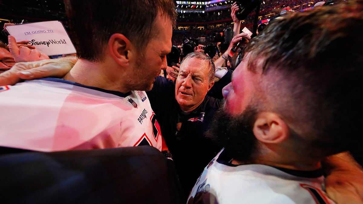 Head coach Bill Belichick of the New England Patriots celebrates with Tom Brady #12 and Julian Edelman #11 after the Patriots defeat the Los Angeles Rams 13-3 during Super Bowl LIII at Mercedes-Benz Stadium on February 3, 2019 in Atlanta, Georgia. 