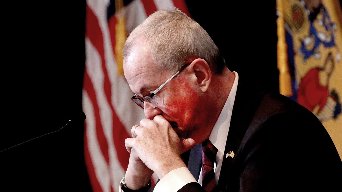 New Jersey Gov. Phil Murphy pauses during his COVID-19 update at the War Memorial in Trenton Feb. 5, 2021. 