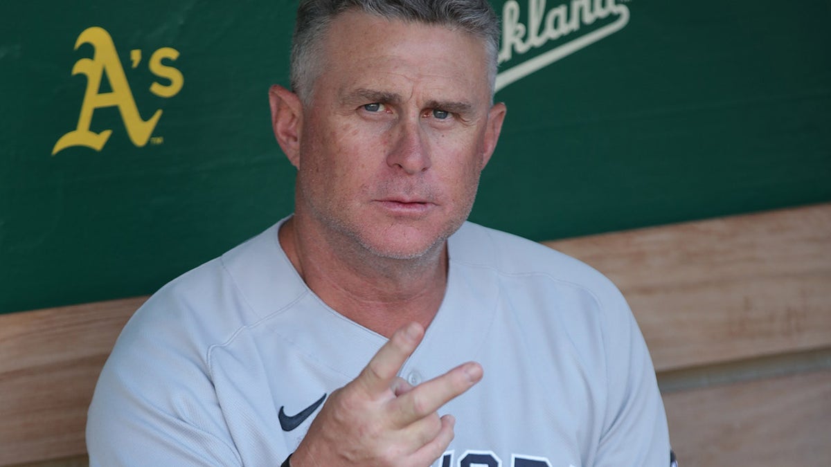 Third base coach Phil Nevin of the New York Yankees in the dugout before the game against the Oakland Athletics at RingCentral Coliseum on Aug. 26, 2021, in Oakland, California.