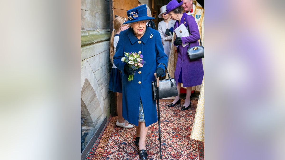 Britain's Queen Elizabeth II, followed by Britain's Princess Anne, right, arrives to attend a Service of Thanksgiving to mark the Centenary of the Royal British Legion at Westminster Abbey, in London, Tuesday, Oct. 12, 2021.