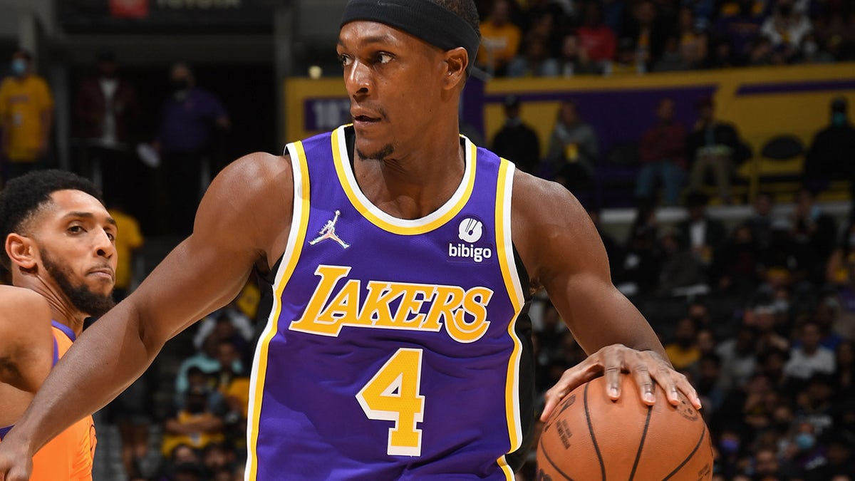 LOS ANGELES, CA - OCTOBER 22: Rajon Rondo #4 of the Los Angeles Lakers dribbles the ball against the Phoenix Suns on October 22, 2021 at STAPLES Center in Los Angeles, California.